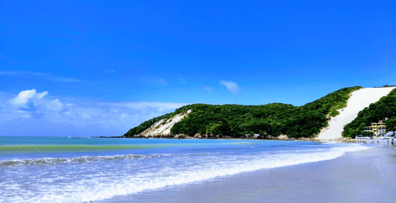 Playa de Ponta Negra en Natal Brasil con dunas blancas y mar turquesa - Oficina de cambio de divisas Global Exchange Playa de Ponta Negra en Natal Brasil con dunas blancas y mar turquesa - Oficina de cambio de divisas Global Exchange
