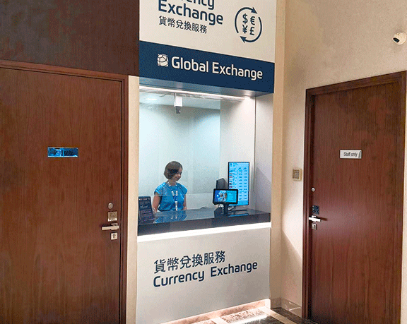 Oficina de cambio de moneda en el G/F Betting Hall del Happy Valley Racecourse, Hong Kong